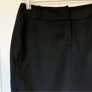 Next Black Mini Skirt. Slit up back. Size 12 UK.